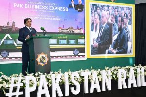Federal Minister for Railways Muhammad Hanif Abbasi addresses the audience after inaugurating the Pak Business Express Train at Lahore Railway Station.