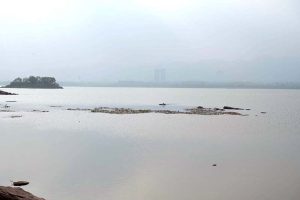 The water level continues to rise steadily in Rawal Dam by the following torrential downpour in the twin cities