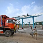 Laborers are busy constructing sheds for buses at the charging station in H-8, as part of the Capital Development Authority's (CDA) project to expand the city’s electric bus network.