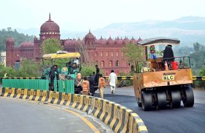 Heavy machinery being used for road carpeting on Murree Expressway near 17 Meel in the federal capital