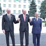 Prime Minister Muhammad Shehbaz Sharif, President of Turkiye Recep Tayyip Erdogan and President of Azerbaijan Ilham Aliyev holding hands in solidarity showing the strong brotherly ties between the three countries after the conclusion of 17th ECO Summit