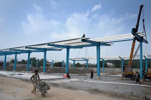 Laborers are busy constructing sheds for buses at the charging station in H-8, as part of the Capital Development Authority's (CDA) project to expand the city’s electric bus network.