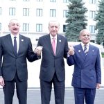 Prime Minister Muhammad Shehbaz Sharif, President of Turkiye Recep Tayyip Erdogan and President of Azerbaijan Ilham Aliyev holding hands in solidarity showing the strong brotherly ties between the three countries after the conclusion of 17th ECO Summit