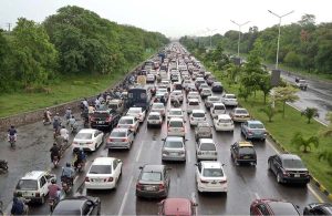 A view of traffic Jam on Islamabad Express Way after rain in the twin city