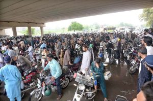 A view of traffic Jam on Islamabad Express Way after rain in the twin city