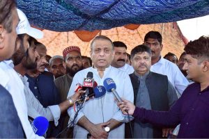 Federal Minister for Communications Abdul Aleem Khan is expressing condolences and offering Fateha to the family of Lance Naik Ghulam Saeed, martyred in the bus shooting in Balochistan