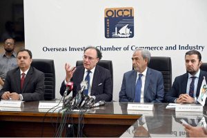 Finance Minister Senator Muhammad Aurangzeb Talking to Media Persons during visiting overseas Investors Chamber of Commerce & Industry (OICCI) at here.