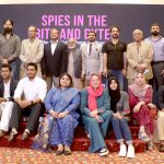 Former Air Chief Marshal Sohail Aman, Dr. Atif Ali, and others pose for a group photo at the conclusion of the ceremony held to mark the launch of Dr. Atif Ali's book