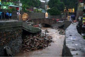 The boundary wall of a nullah in Saidpur Village collapsed due to flooding caused by heavy rainfall in the Federal Capital.