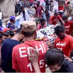A body is being retrieved from the debris of a collapsed residential building in Baghdadi, Lyari. Rescue workers continue their efforts amid scenes of devastation and despair