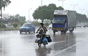 A view of traffic Jam on Islamabad Express Way after rain in the twin city