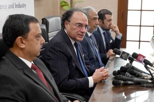 Finance Minister Senator Muhammad Aurangzeb Talking to Media Persons during visiting overseas Investors Chamber of Commerce & Industry (OICCI) at here.