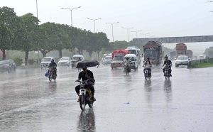 A view of traffic Jam on Islamabad Express Way after rain in the twin city
