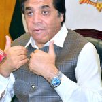 Federal Minister for Railways Hanif Abbasi addresses the ceremony during the signing of an agreement with PITBULL at the Committee Room of Railway Headquarters.