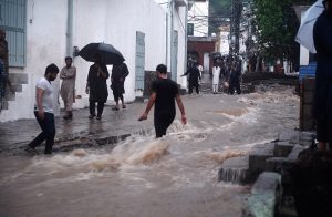 The boundary wall of a nullah in Saidpur Village collapsed due to flooding caused by heavy rainfall in the Federal Capital.