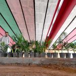 PHA workers planting greenery along the road divider under the bridge near PHA Society to beautify the area