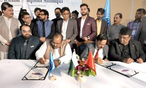 Officials signing after inauguration ceremony launch of china – Pakistan TEVT industrial center of excellence at HITMS