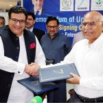 CEO SMEDA Mr. Socrat Aman Rana signs the MoU with Chairman Akhuwat Foundation Dr. Amjad Saqib in the presence of the Secretary MoIP Mr. saif Anjum