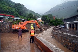 The boundary wall of a nullah in Saidpur Village collapsed due to flooding caused by heavy rainfall in the Federal Capital.