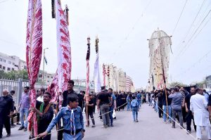 The main procession of 8th Muharram-ul-Haram passes through M.A. Jinnah Road