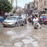 Vehicular traffic faces problems in movement due to stagnant sewage water on the road at Gulshan-e- Iqbal 13-D Area