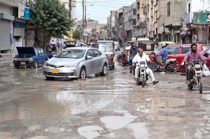 Vehicular traffic faces problems in movement due to stagnant sewage water on the road at Gulshan-e- Iqbal 13-D Area