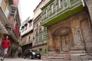 People play cricket in Mohalla Sethian, located in the heart of Peshawar’s old walled city, where seven historic havelis—architectural gems of the 18th and 19th centuries once owned by the Sethi merchant family—now stand in neglect