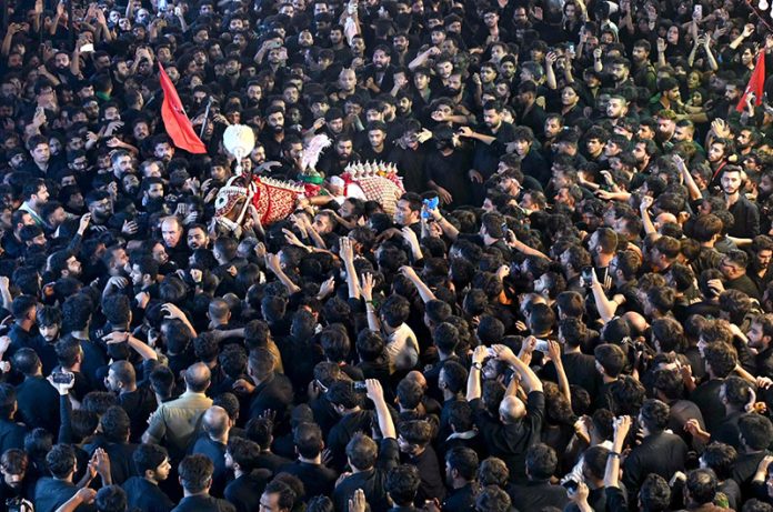 A large number of mourners attending the main procession of 9th Muharram-ul-Haram at Nisaar Haveli. Muharramul Harram known as the first month of the Islamic calendar and the mourning month in remembrance of the martyrdom (Shahadat) of Hazrat Imam Hussain (AS), the grandson of the Holy Prophet Mohammad (SAWW)