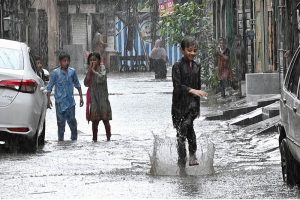 Vehicles navigate through inundated Poonch Road as daily life is disrupted following torrential rains in the provincial capital