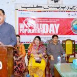 District Health Officer Pir Ghulam Hussein addresses a gathering on World Population Day, organized by the Population Welfare Department of Sindh at the Press Club