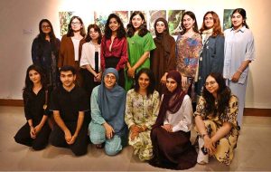 Visitors and art enthusiasts keenly observe artworks on display at the inaugural exhibition titled "Seeing", curated by Sarah Rajper at PNCA