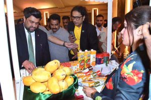 Sindh Governor Kamran Khan Tessori visits a mango stall at the mango festival hosted by the Ministry of Foreign Affairs at a local hotel