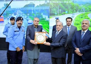 Interior Minister Syed Mohsin Raza Naqvi presents an honorary shield to Prime Minister Muhammad Shehbaz Sharif during his visit of Safe City Capital Command and Control Center.