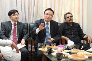 Zhao Shiren, Consul General of China in Lahore, talks to journalists during his visit to the Associated Press of Pakistan office at Radio Pakistan.