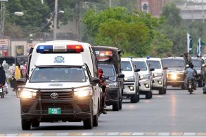 A view of security officials holding a flag march to develop a sense of protection among the masses and maintain law and order during the holy month of Muharram-ul-Haram