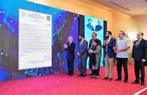 Prime Minister Muhammad Shehbaz Sharif presents the first digitally issued medical licence to the CEO of Kwik Test Private Ltd., at the inaugural ceremony of the digital system for licensing and registration of medical devices.