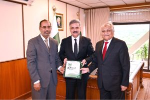 Chief Information Commissioner, Shoaib Ahmed Siddiqui, along with Ijaz Hassan Awan, Information Commissioner, presenting the bi-annual report to the Hon'ble Chief Justice of Pakistan at the Supreme Court of Pakistan.