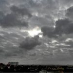 A beautiful view as Nimbostratus clouds blanket the sky in a dark gray layer over the metropolis, heralding the imminent arrival of rain in the provincial capital