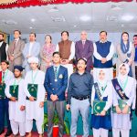 Federal Minister for Railways Muhammad Hanif Abbasi in a group photo with top position-holding students during an award ceremony at Fatima Jinnah Women University, where BISE Rawalpindi honored the high achievers
