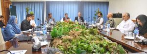 Federal Minister for Poverty Alleviation and social safety Syed Imran Ahmed Shah being briefed by the CEO of Trust for Voluntary Organizations Mr. Ghulam Muhiyuddin at TVO headquarters in federal capital