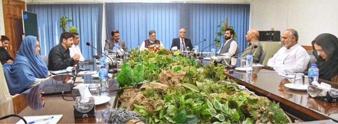 Federal Minister for Poverty Alleviation and social safety Syed Imran Ahmed Shah being briefed by the CEO of Trust for Voluntary Organizations Mr. Ghulam Muhiyuddin at TVO headquarters in federal capital