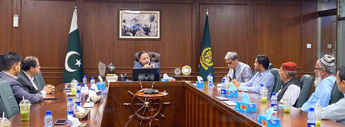 Federal Minister for Maritime Affairs, Muhammad Junaid Anwar Chaudhry speaking with a delegation from the Gwadar Press Club led by its President Ismail Umar in the Federal Capital