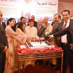 Federal Minister for National Food Security and Research, Industries and Production, Rana Tanveer Hussain along with The Ambassador of the Kingdom of Morocco and Mrs Mohamed Karmoune and other dignitaries cutting cake on the occasion of the Twenty Sixth Anniversary of the Accession to The Throne of King Mohammed VI of Morocco at a local hotel