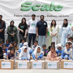 Saeed Ajmal interacts with students