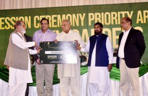 Housing minister hands over plot possession letters in Sky Gardens project