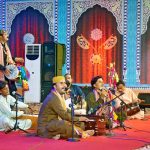 A folk singer performing at Bhitshah Auditorium during 282nd urs celebration of Hazrat Shah Abdul Latif Bhitai