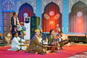 A folk singer performing at Bhitshah Auditorium during 282nd urs celebration of Hazrat Shah Abdul Latif Bhitai