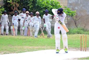 A youngster is in action during the trials of the PCB Inter-School Cricket Talent Hunt Program at the Comprehensive High School Ground in Latifabad.