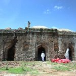 Workers are busy in renovation work of Mai Qamro mosque. The rulers of Gakhar dynasty erected many marvelous monuments during their reign. The mosque of Mai Qamro is prominent among the many historical buildings in the vicinity of Islamabad. This mosque is situated west of Bagh Jogian village near bank of Soan River facing the formidable fort of Pharwala on the left bank. It is the oldest mosque in Islamabad. Mai Qamro mosque is a great specimen of Gakhar architecture which appears to have been built in early 16th century. The mosque is believed to have been built by Mai Qamro, wife of Hathi Khan Gakhar, a descendant of the Gakhar dynasty. The mosque is built on a rectangular plan and crowned with three squat domes. Local stone had been used to construct the mosque and lime plaster applied, traces of which are still visible on the façade of the mosque