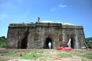 Workers are busy in renovation work of Mai Qamro mosque. The rulers of Gakhar dynasty erected many marvelous monuments during their reign. The mosque of Mai Qamro is prominent among the many historical buildings in the vicinity of Islamabad. This mosque is situated west of Bagh Jogian village near bank of Soan River facing the formidable fort of Pharwala on the left bank. It is the oldest mosque in Islamabad. Mai Qamro mosque is a great specimen of Gakhar architecture which appears to have been built in early 16th century. The mosque is believed to have been built by Mai Qamro, wife of Hathi Khan Gakhar, a descendant of the Gakhar dynasty. The mosque is built on a rectangular plan and crowned with three squat domes. Local stone had been used to construct the mosque and lime plaster applied, traces of which are still visible on the façade of the mosque